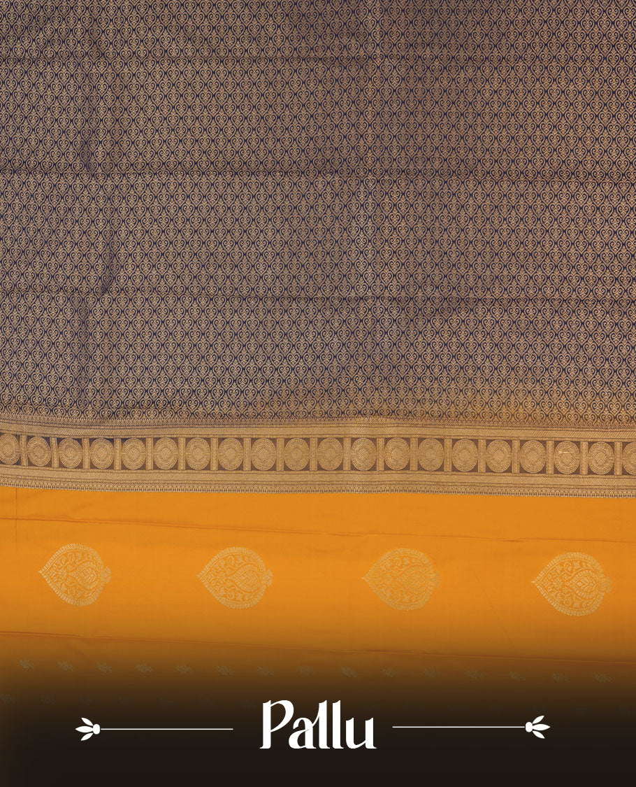 Mustard colour semi silk saree highlighting gold zari motifs across body, featuring contrast Dark blue colour border with gold zari pattern, comes with matching blouse .