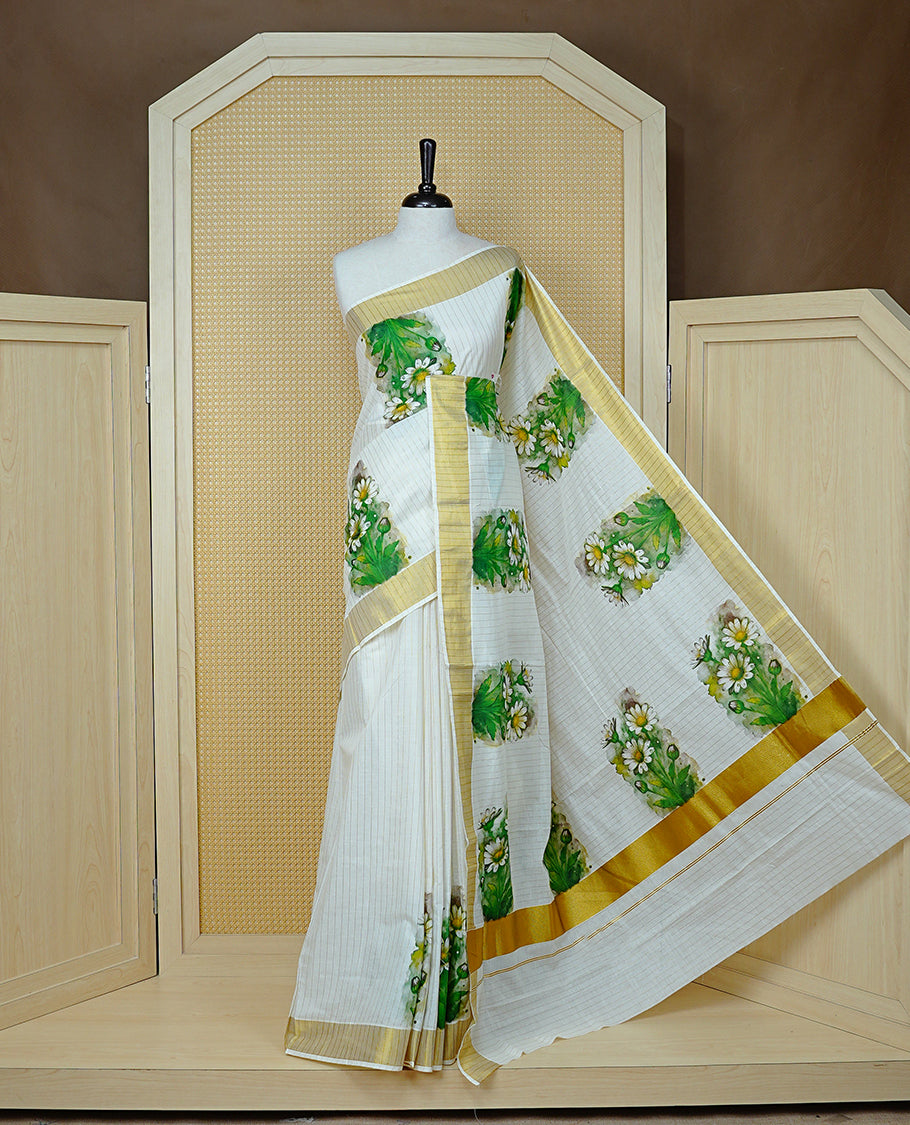 Cream Colour Cotton Kerala Saree Featuring A Light Gold Zari Pattern And Floral Prints On The Body, Enhanced By A Traditional Zari Border And Pallu, Paired With A Matching Blouse Piece