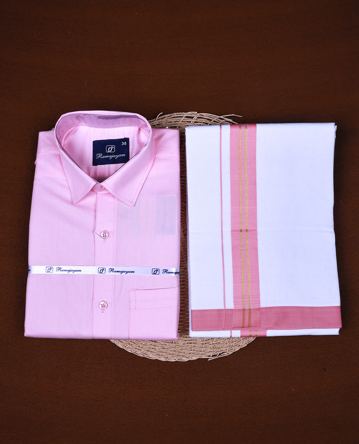 Pink colour RAMAJAYAM shirt paired with a matching dhoti, finishing with a Pink kara
