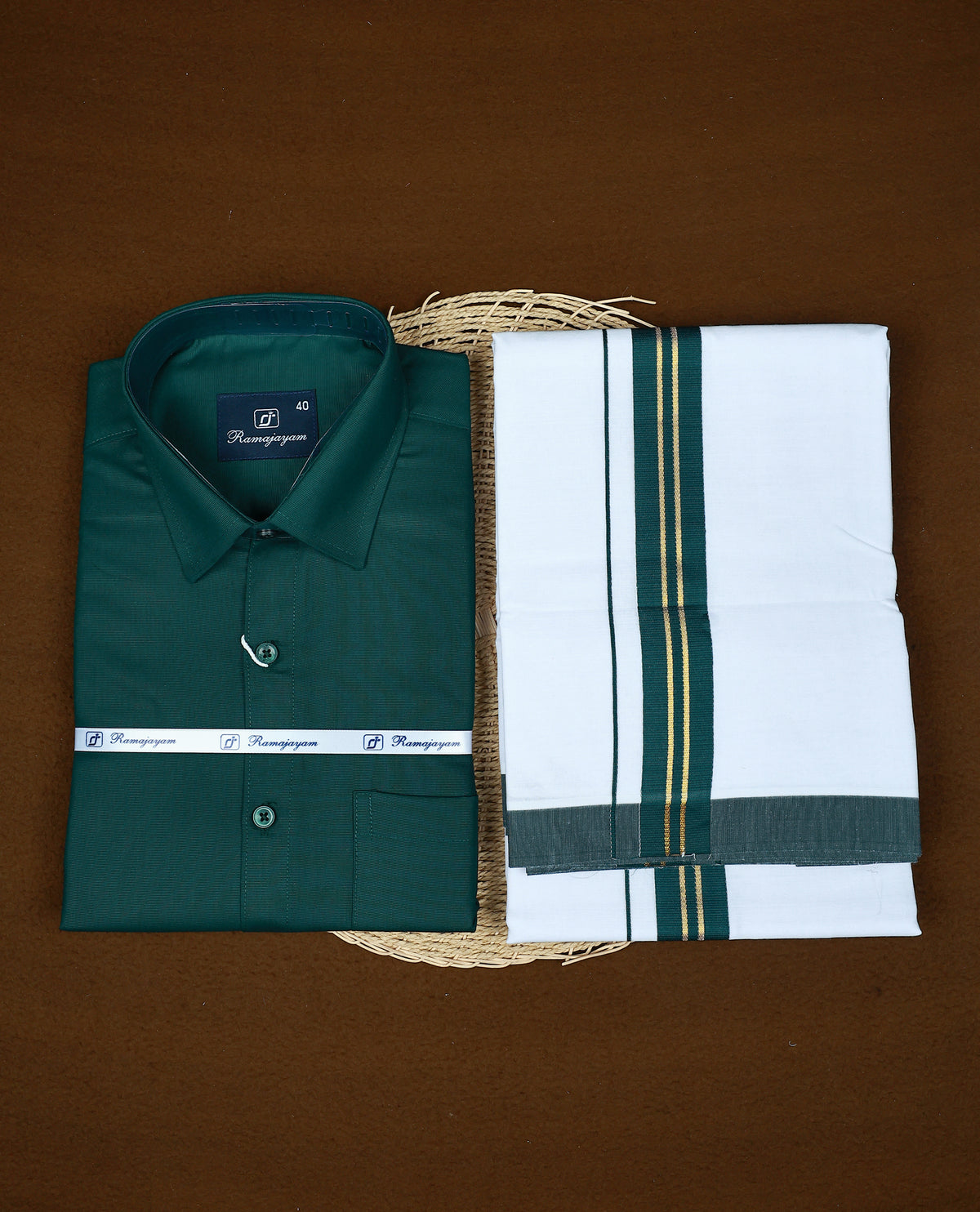 Dark Green colour RAMAJAYAM shirt paired with a matching dhoti, finishing with a Green kara