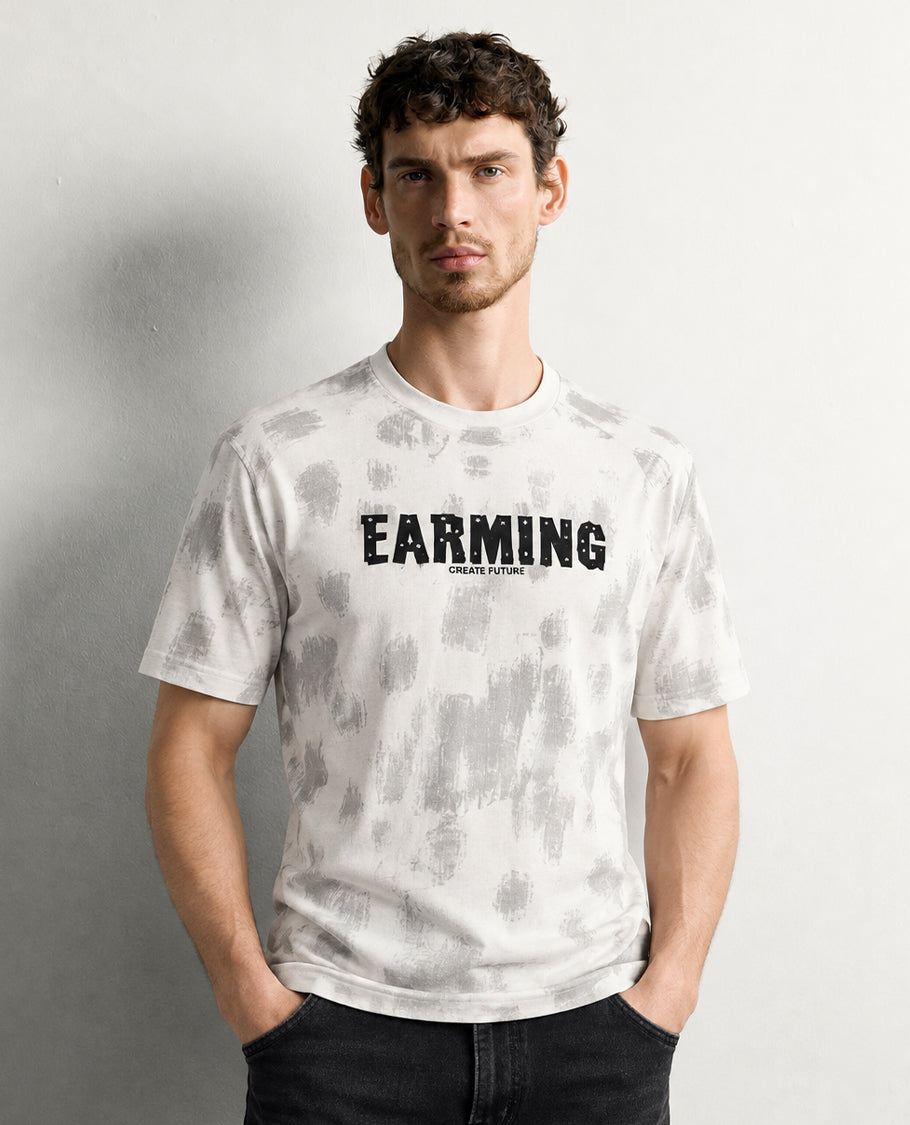 Beige colour t shirt featuring round design neck, elegant Design body with a text, Half sleeve.