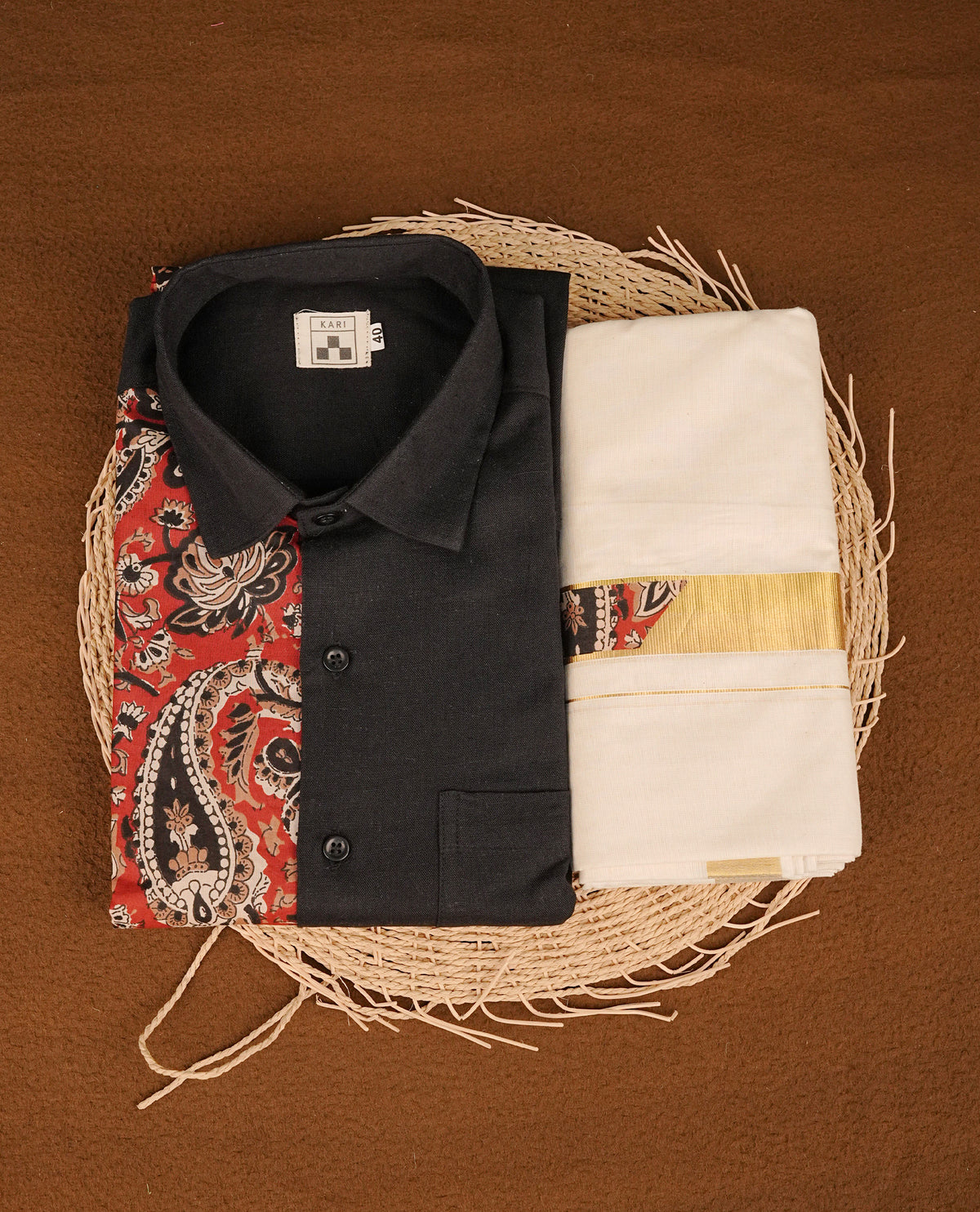 Black & Multi colour shirt featuring Floral Pattern printed body, paired with cream colour double dhoti featuring Gold zari with Same Pattern border.
