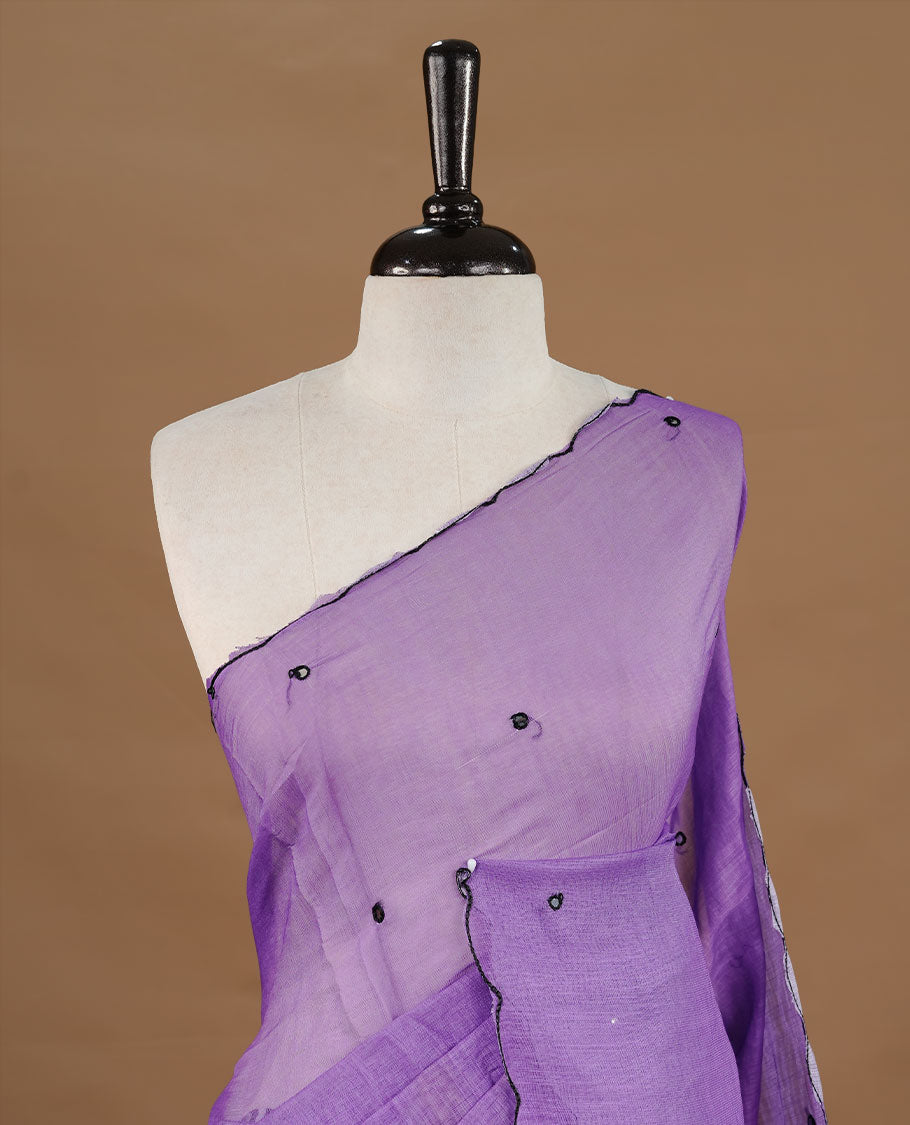 Violet colour Semi Linen saree featuring mirror work with intricate thread detailing, enhanced by a stylish scallop border. Comes without a blouse piece.