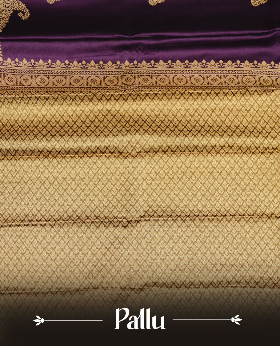 Purple colour soft silk sareee featuring rose gold zari motifs on body, complemented by self colour with zari border, contrast green pallu paired with matching blouse piece.