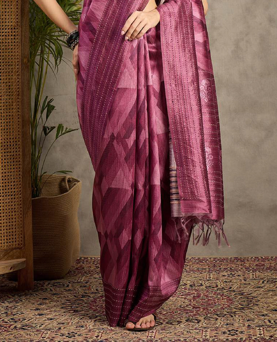 Grape toned semi Tussar saree featuring contemporary fancy prints across the body, enhanced with a subtle Katha style stitched border, paired with a matching blouse for a stylish and elegant ethnic look.