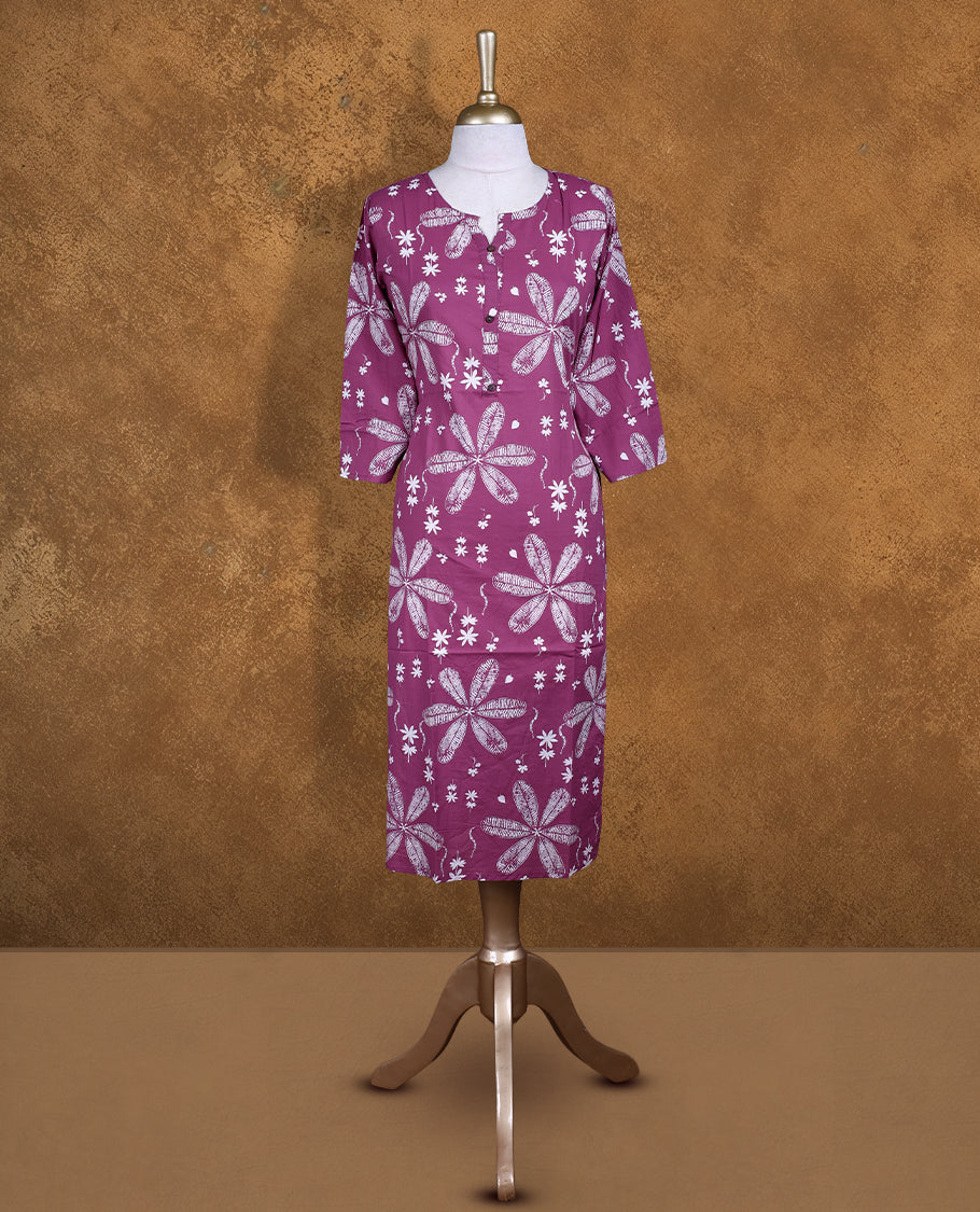 Mauve colour Kurti featuring floral print pattern across, round neckline with split, and sleeves,