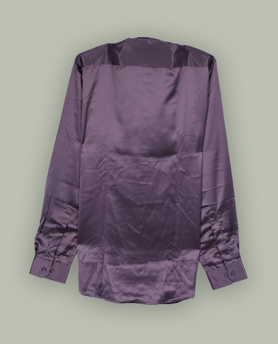 Rich purple colour satin shirt with a glossy finish, featuring a classic collar and full sleeves with broad cuffs, Designed with a front pocket and button-down style, adding a refined touch to formal or party looks.