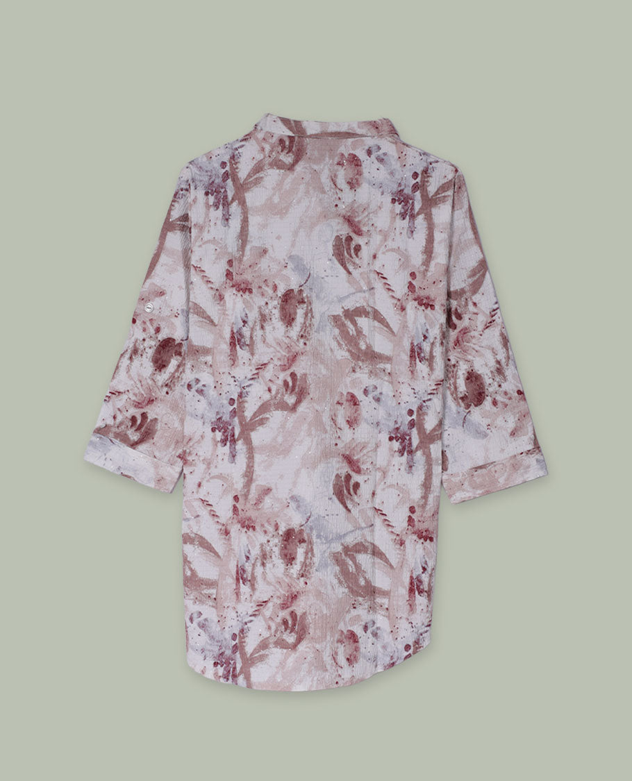 Blush and beige abstract printed tunic top with band collar, half button placket, three-quarter sleeves, and curved hem.