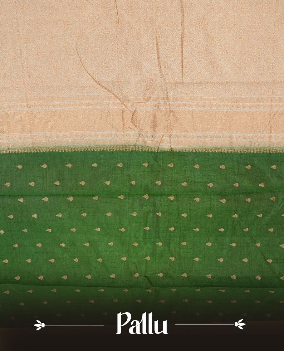 Green colour semi tussar saree featuring gold zari buttas across body, contrast cream colour gold zari border and comes with matching blouse piece.