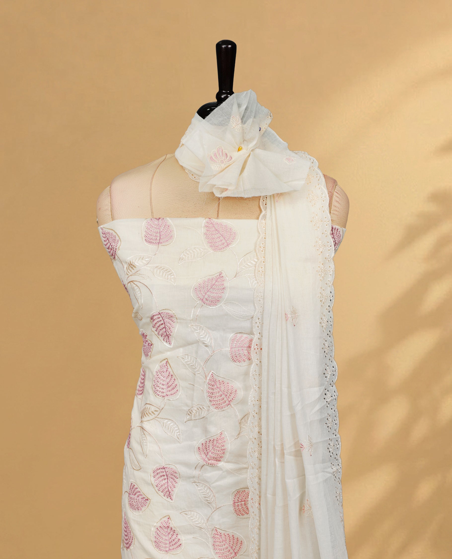 Cream colour salwar material Featuring Pink Thread Leaf Pattern on body, paired with matching bottom & Elegant Dupatta