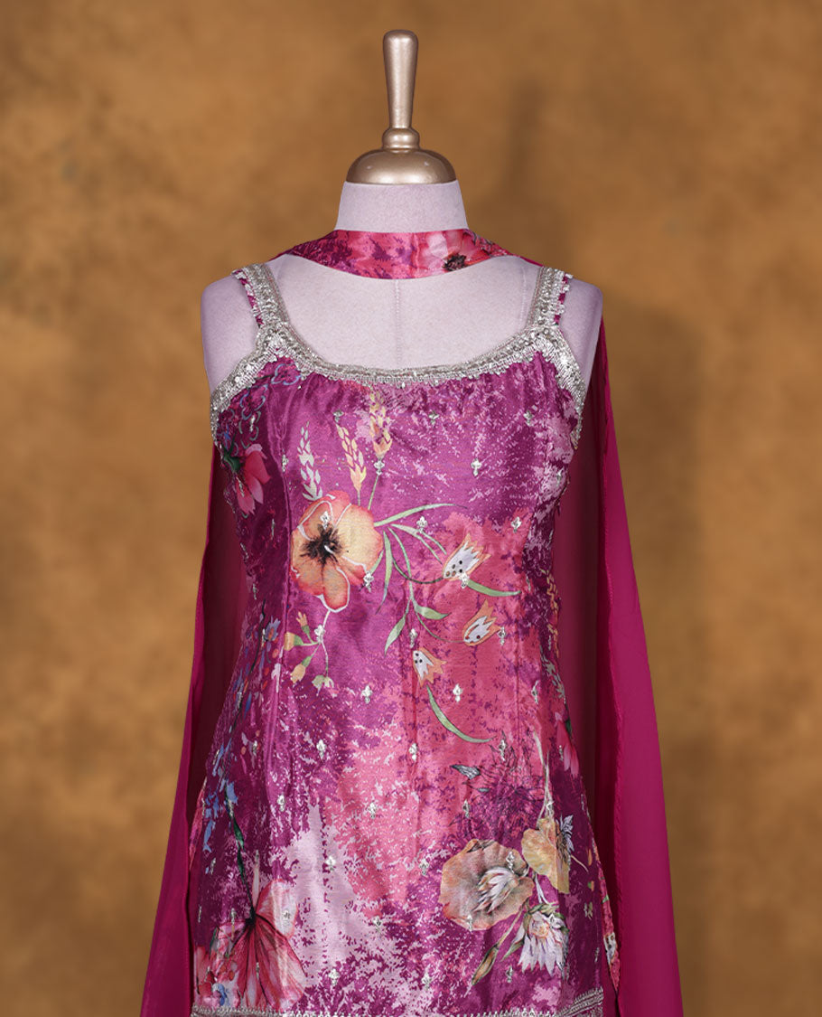 Dark pink colour sharara set featuring gold stone pattern neckline, sleeveless, and stone & floral print pattern across on body , Paired with a matching dupatta