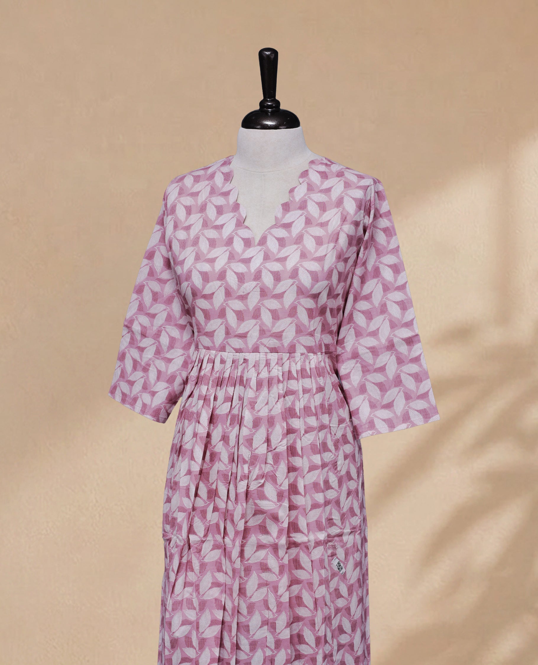 Light Pink Colour Kurti With An Elegant White Leaf Prints All Over The Body , Comes With Sleeve