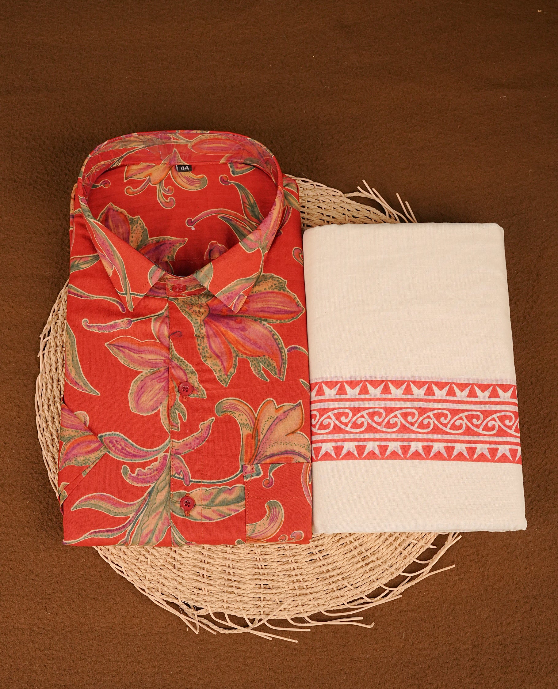 Maroon colour shirt featuring Floral Pattern printed body, paired with cream colour double dhoti featuring Red colour printed border.