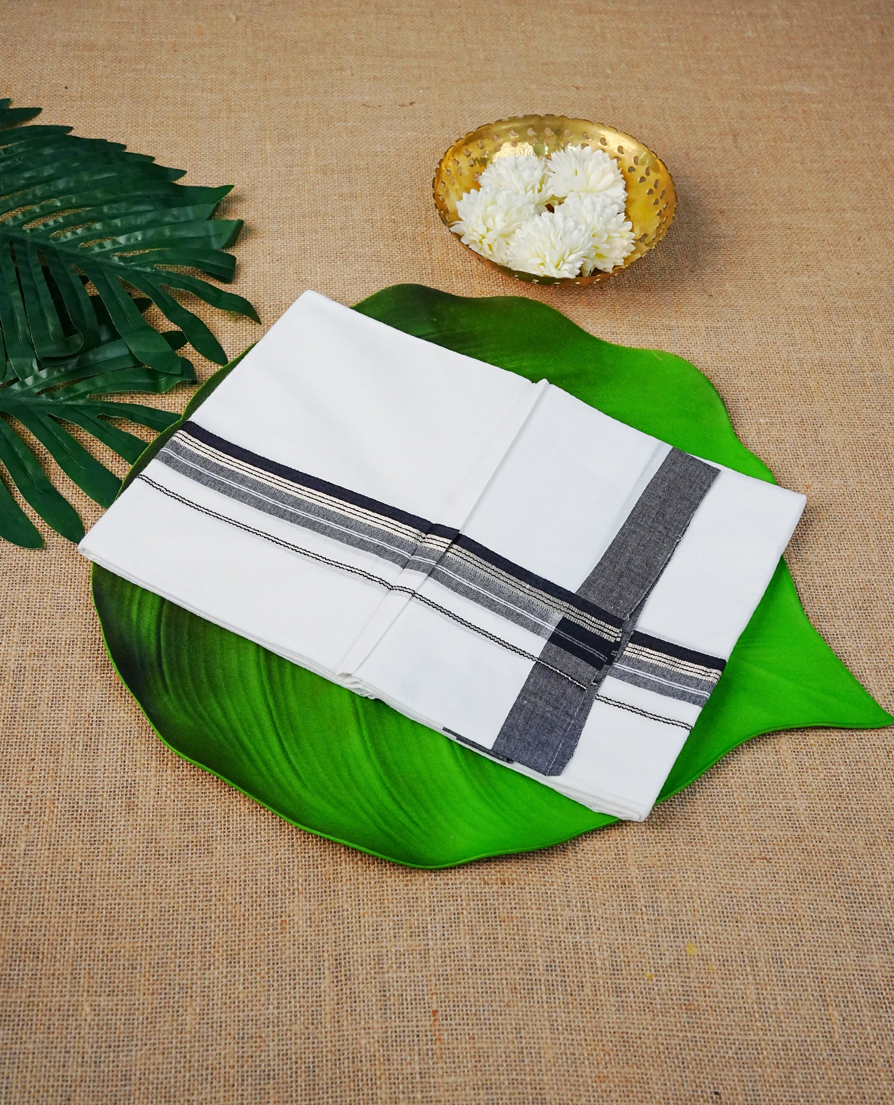 Off white Colour Cotton Double Dhoti Finished With A Classic Light gold & Black Kara.