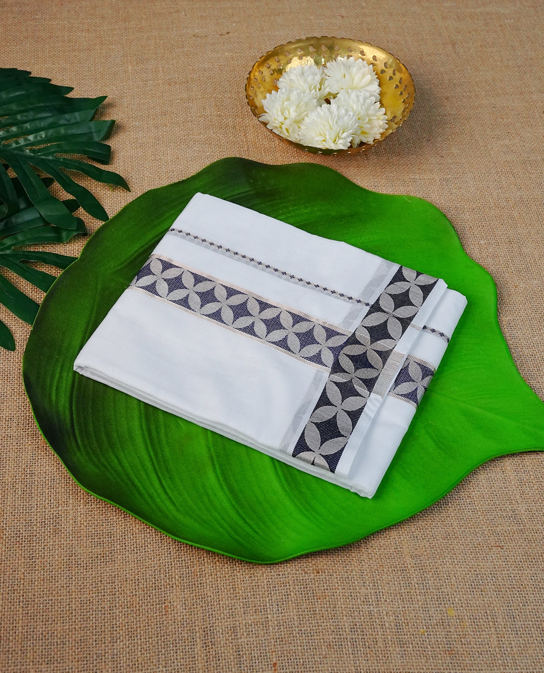 Off White Colour Cotton Double Dhoti Finished With A Classic Silver Zari & Blue Kara.