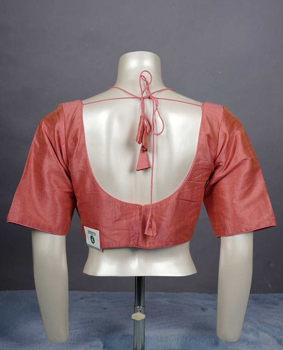 Peach colour colour silk padded readymade blouse with elbow-length sleeves, a V-neck front, and a deep U-back with tie-up dori.