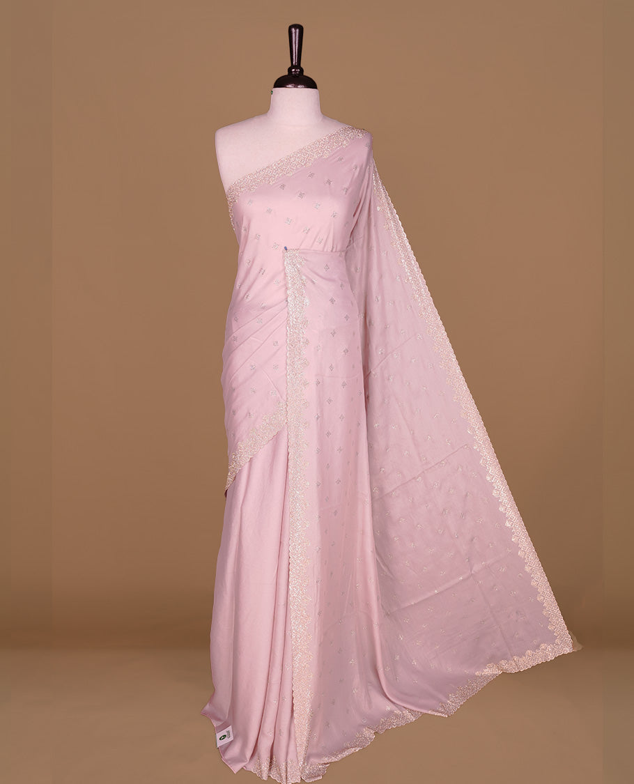 Pink colour organza designer saree featuring Gold stone motifs on body, highlighting light weight stone worked border, paired with matching blouse piece.