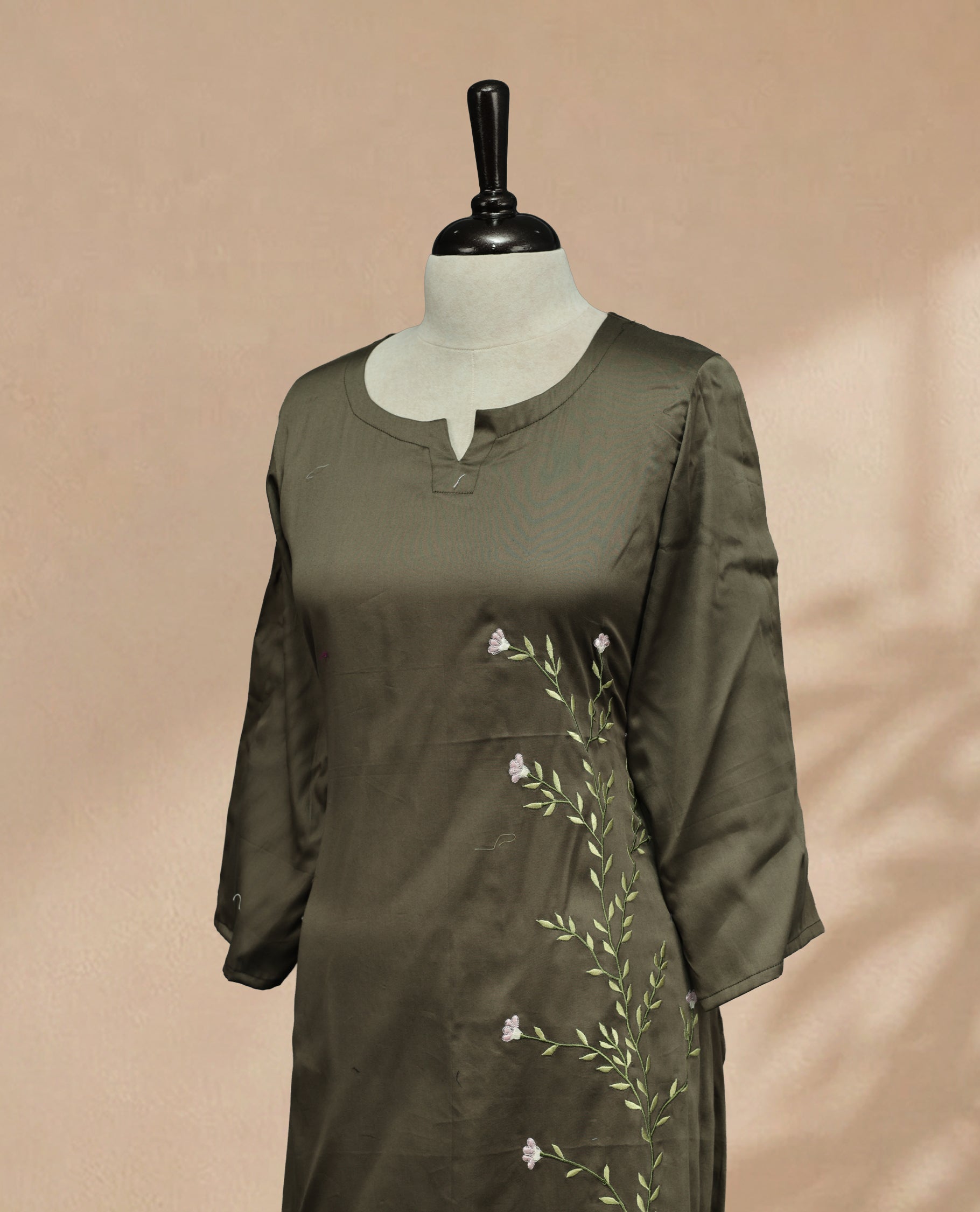 Dark Sage Colour Kurti Featuring U-Shaped Neckline, delicate floral vine embroidery Work On Body & Sleeve
