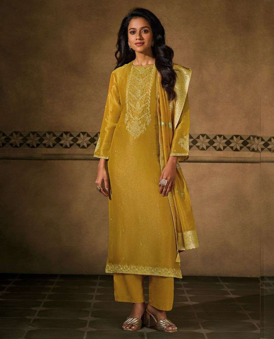 Mustard colour suit material with silk tissue embroidered top featuring elegant handwork and detailed sleeve work, paired with matching satin bottom and a contrast colour lightweight printed dupatta