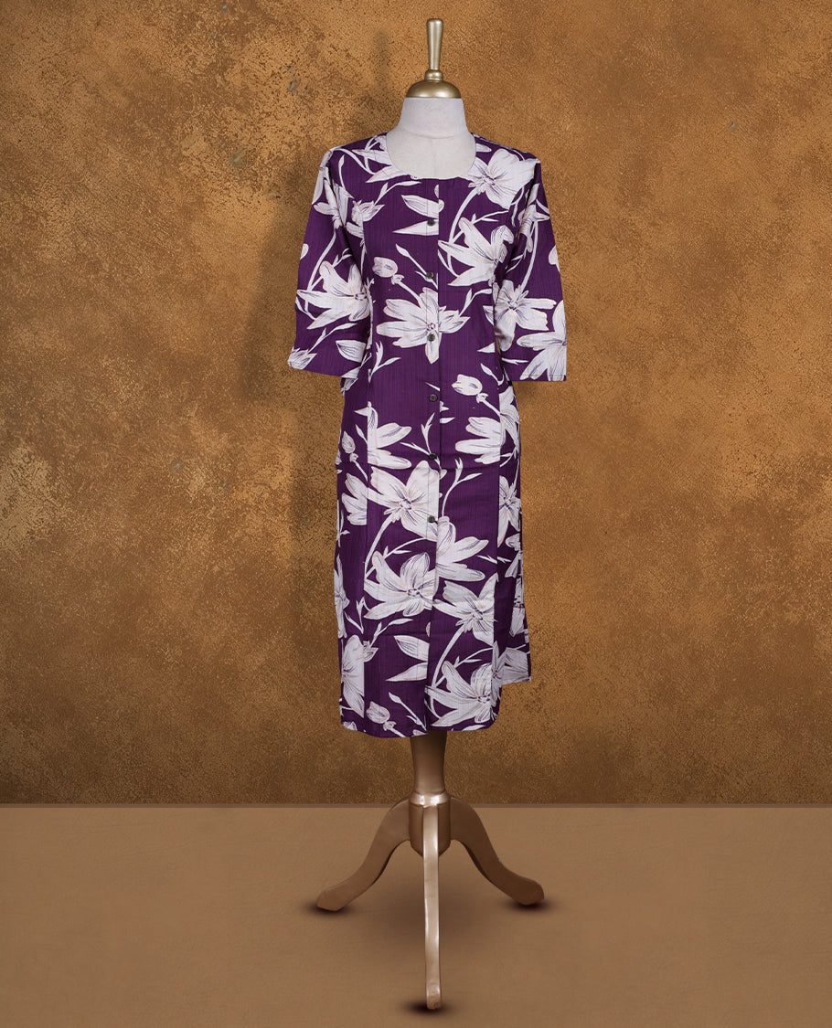 Purple colour kurti adorned with White floral prints, featuring a round neckline with button placket and comfy 3/4th sleeves.