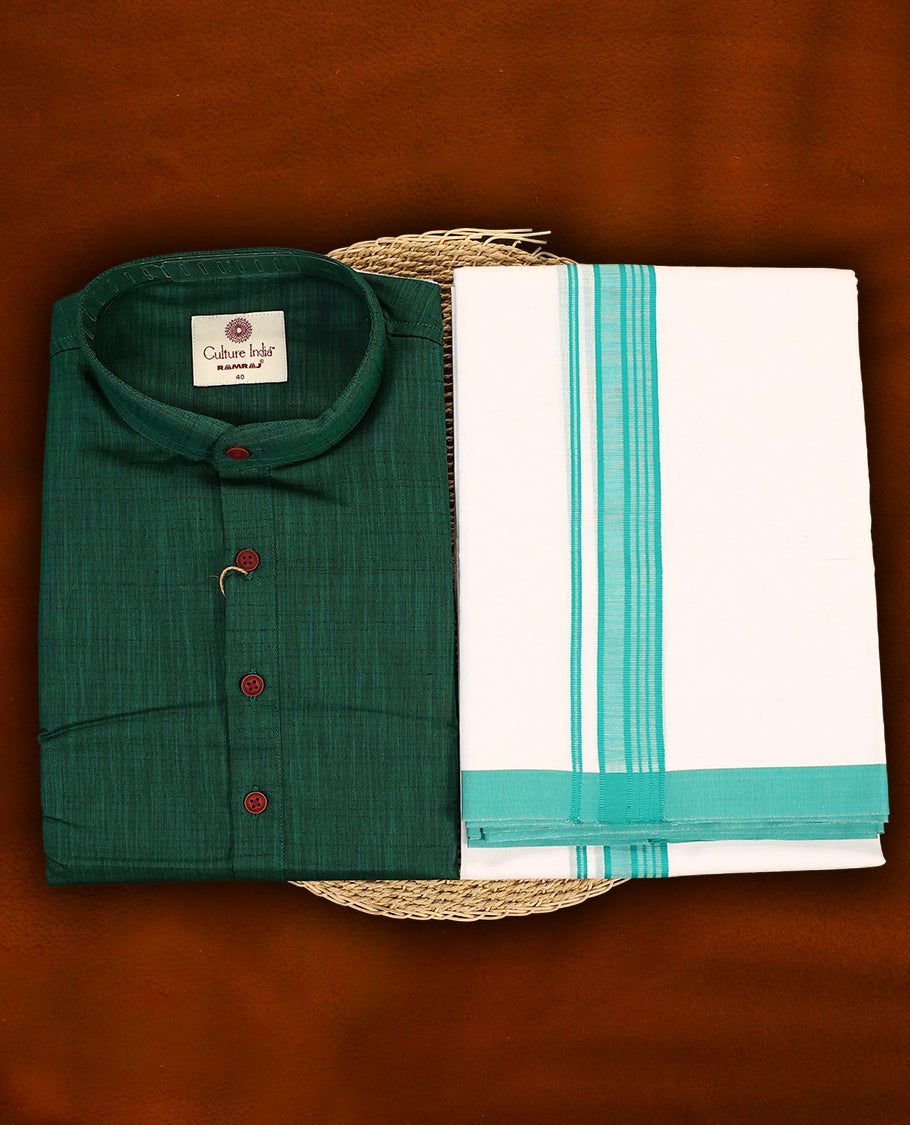RAMRAJ Dark green kurtha paired with a white dhoti, elegantly finished with a matching dark green border.