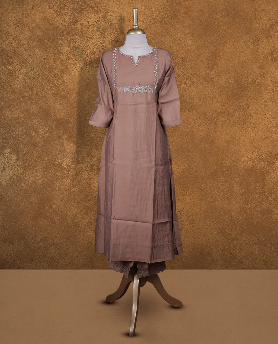 Nude brown colour coord set featuring beats and thread across neckline and matching bottom pant.