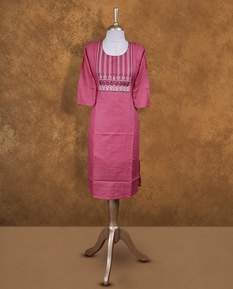 Burgundy rose colour kurti with styled with a thread pattern around neckline, knee length design, and a sleeve