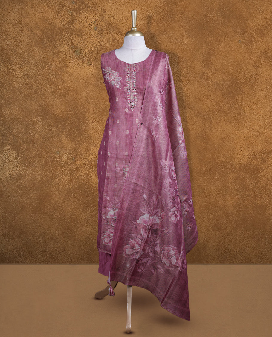 Pinkish bronze colour churidar set featuring thread and Mirror work on neckline, sleeves, and Gold colour motifs on body , Paired with a matching dupatta