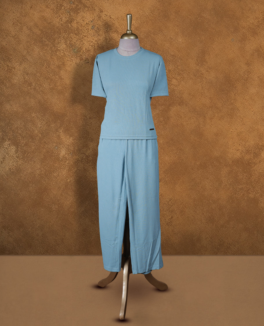 Light blue colour coord set styled with a T shirt design with short sleeve, pair a matching bottom pant .