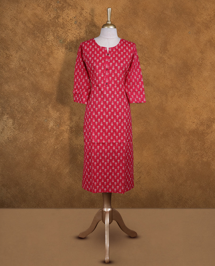 Rani pink colour Kurti featuring floral print pattern across, round neckline with split, and sleeves