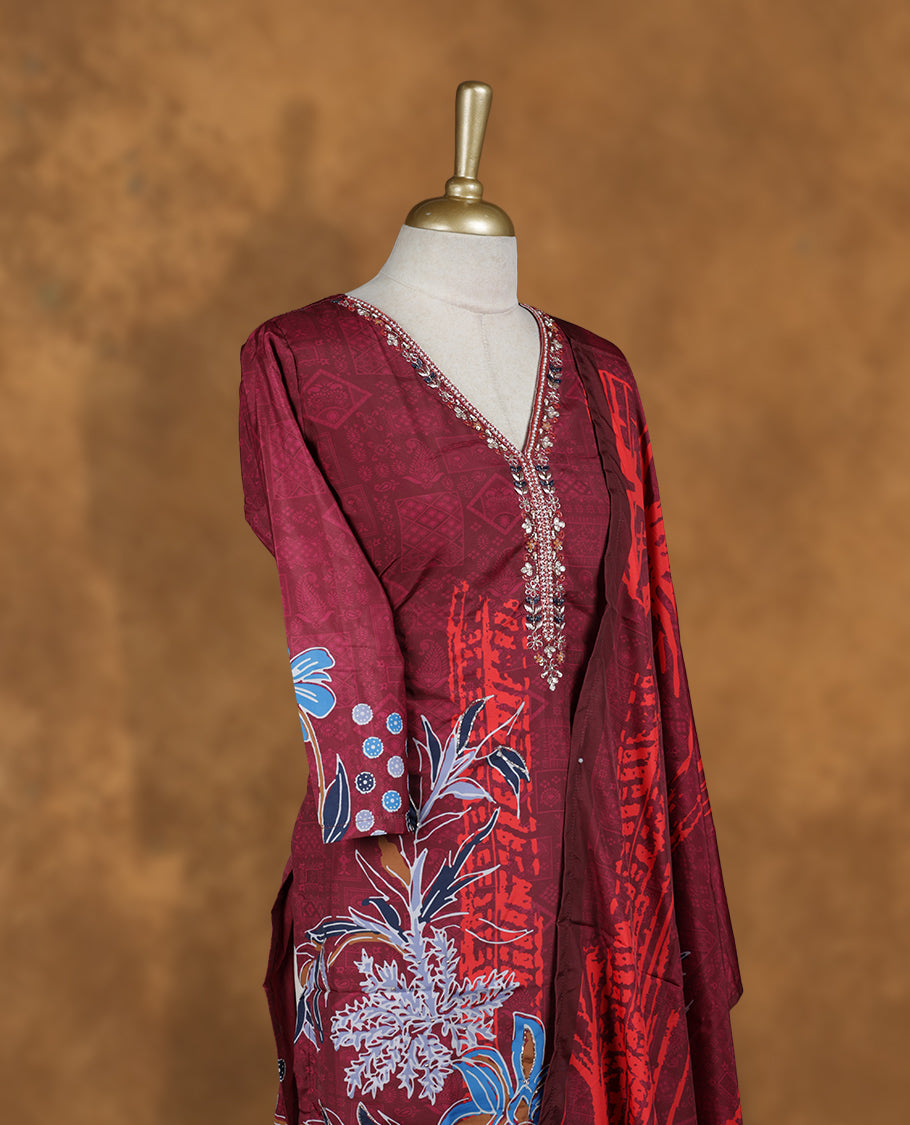 Dark Red colour churidar set featuring elegant cut beat And thread embroidery on the neckline, sleeves, and floral pattern across the body, Paired with a matching dupatta