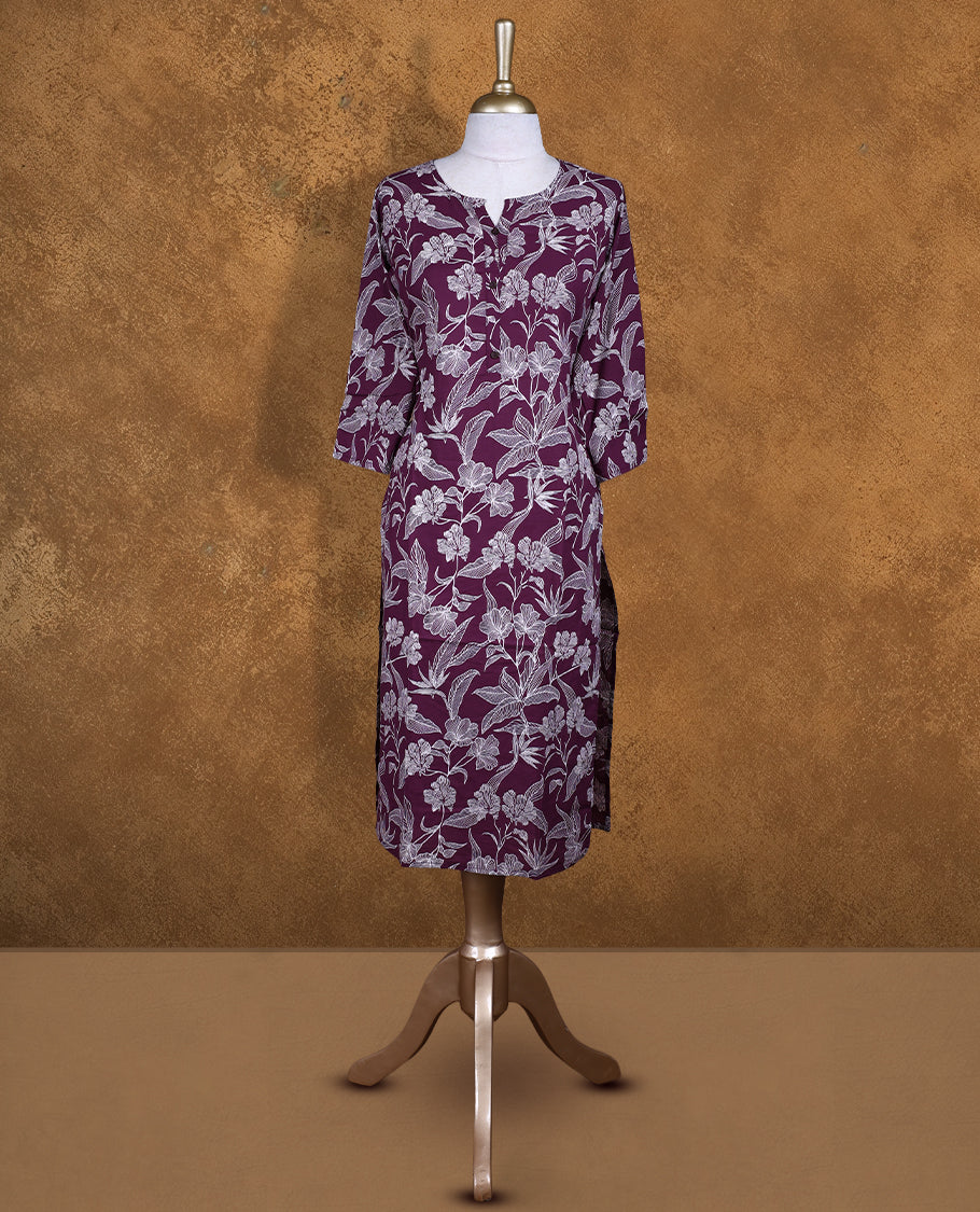Purple colour Kurti featuring floral print pattern across, round neckline with split, and sleeves,