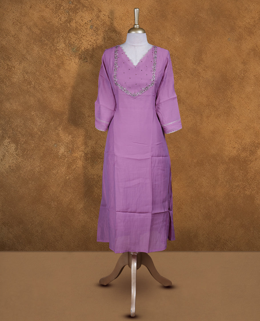 Lavender colour kurti with styled with a thread & beats pattern around neckline & across body, knee length design, and a sleeve .
