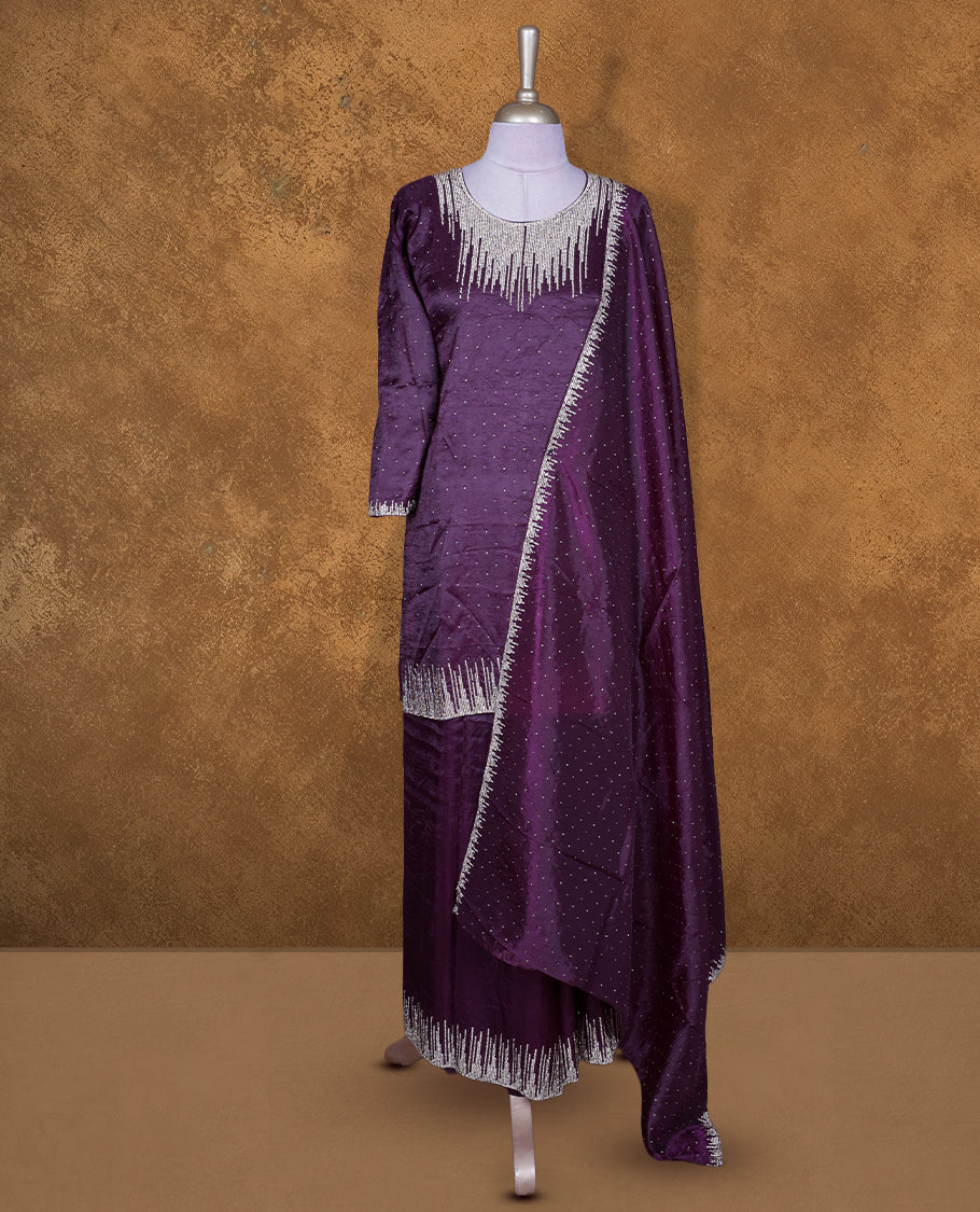 Grape colour sharara set featuring gold stone pattern neckline, sleeves, and stone pattern across on body , Paired with a matching dupatta