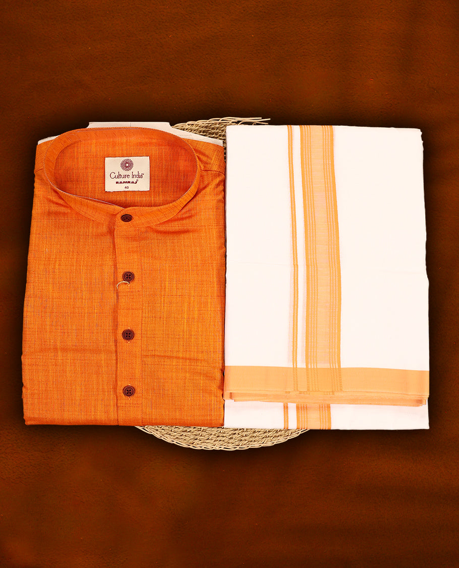 RAMRAJ Orange kurtha paired with a white dhoti, elegantly finished with a matching Orange border.
