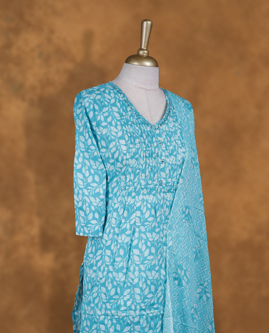 Sky Blue colour churidar set featuring cut beats embroidered neckline, sleeves, and White floral printed pattern on body , Paired with a matching dupatta