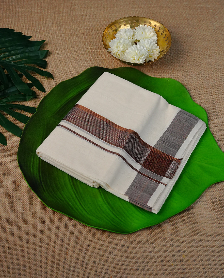 Cream Colour Cotton Double Dhoti Finished With A Classic Body , A Brown & Gold Zari Kara