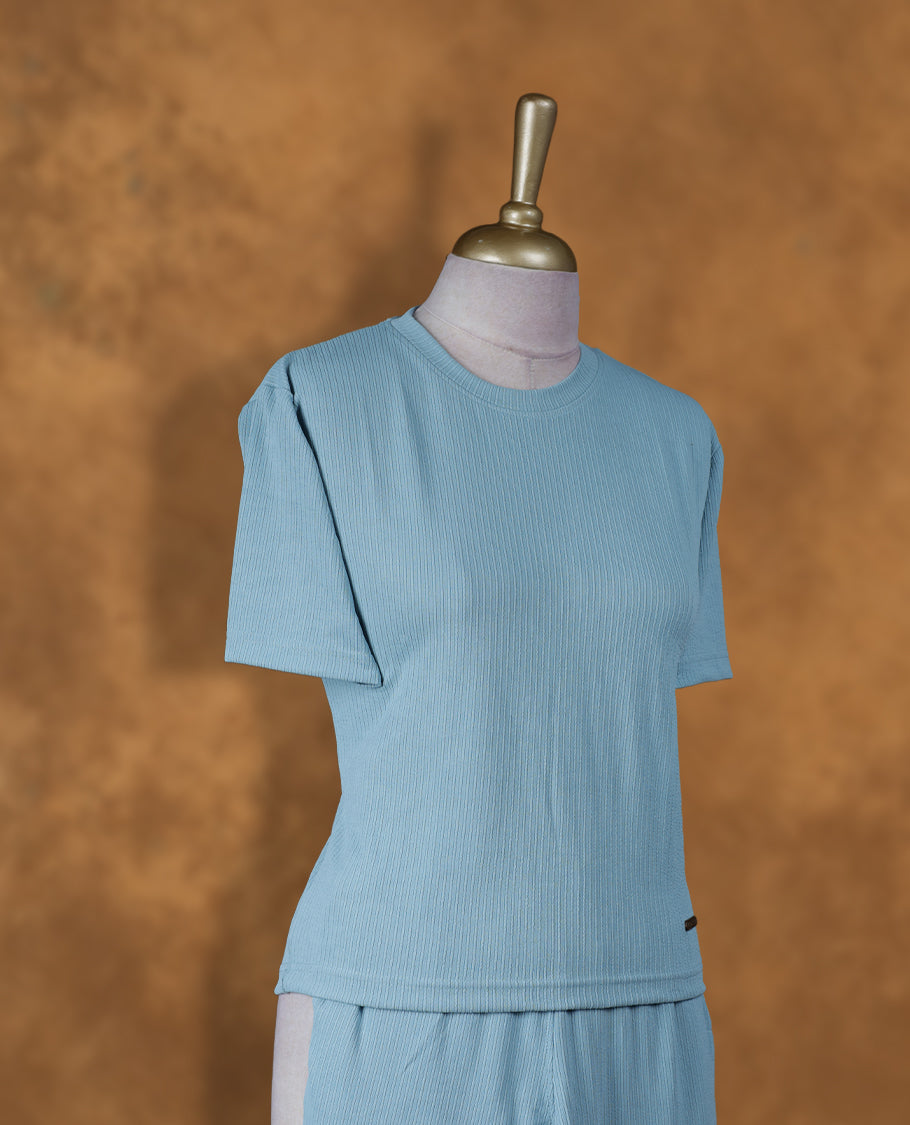 Light blue colour coord set styled with a T shirt design with short sleeve, pair a matching bottom pant .