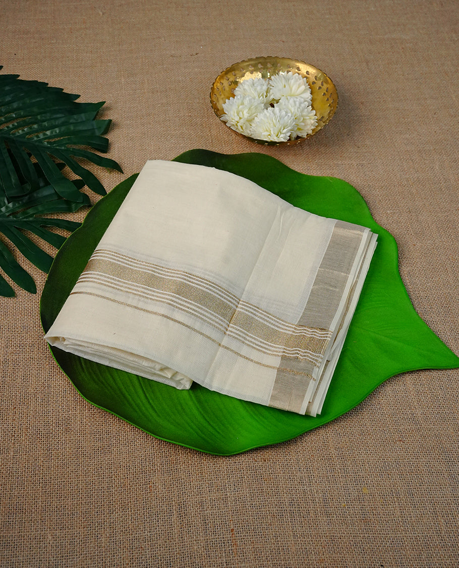 Cream colour Cotton Double dhoti featuring plain with light Gold kara.