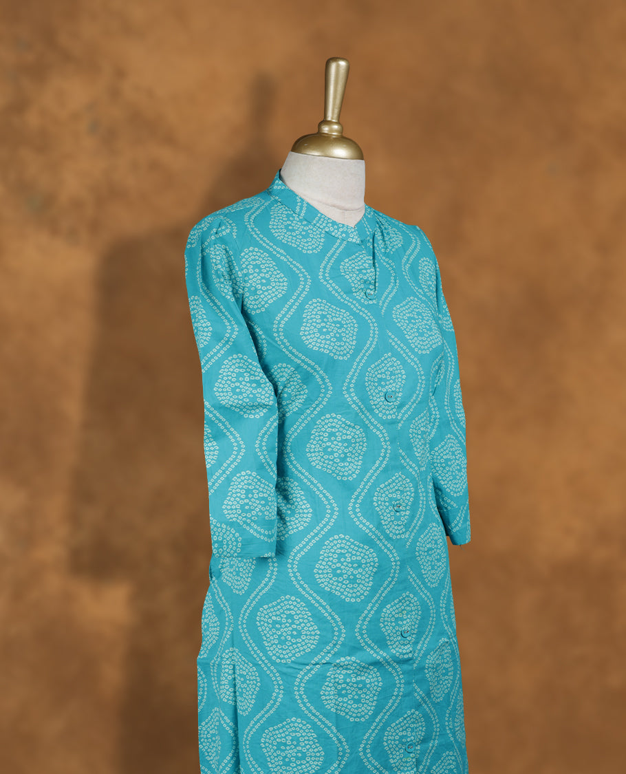 Blue colour coord set featuring white print pattern across body, mandarin collar, and sleeves, Paired with matching pants.