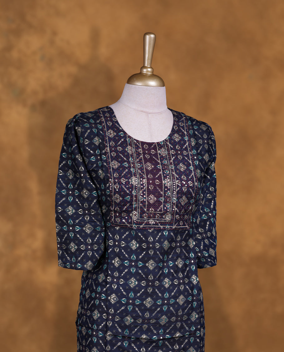 Dark blue colour kurti with styled with a thread pattern around neckline, print on body knee length design, and a sleeve .