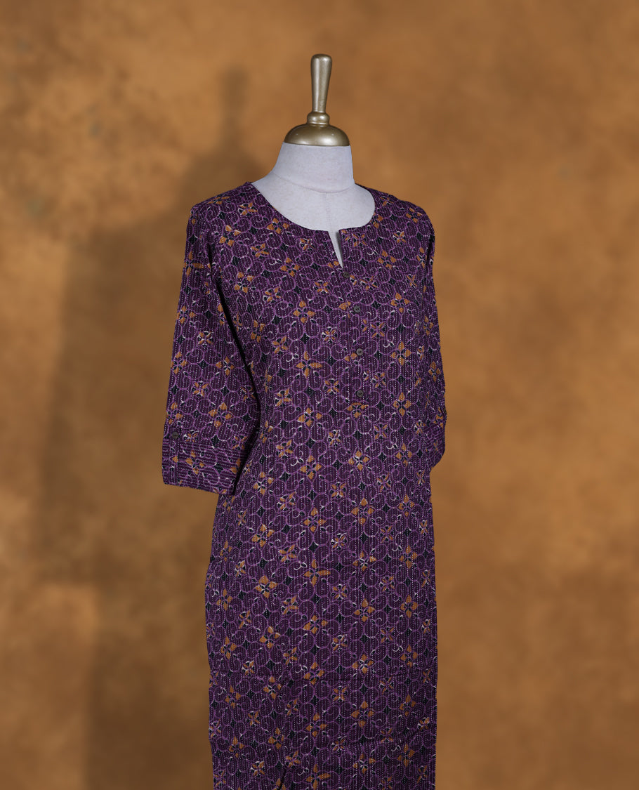 Purple colour Kurti featuring floral print pattern with stripes across, round neckline with split, and sleeves,