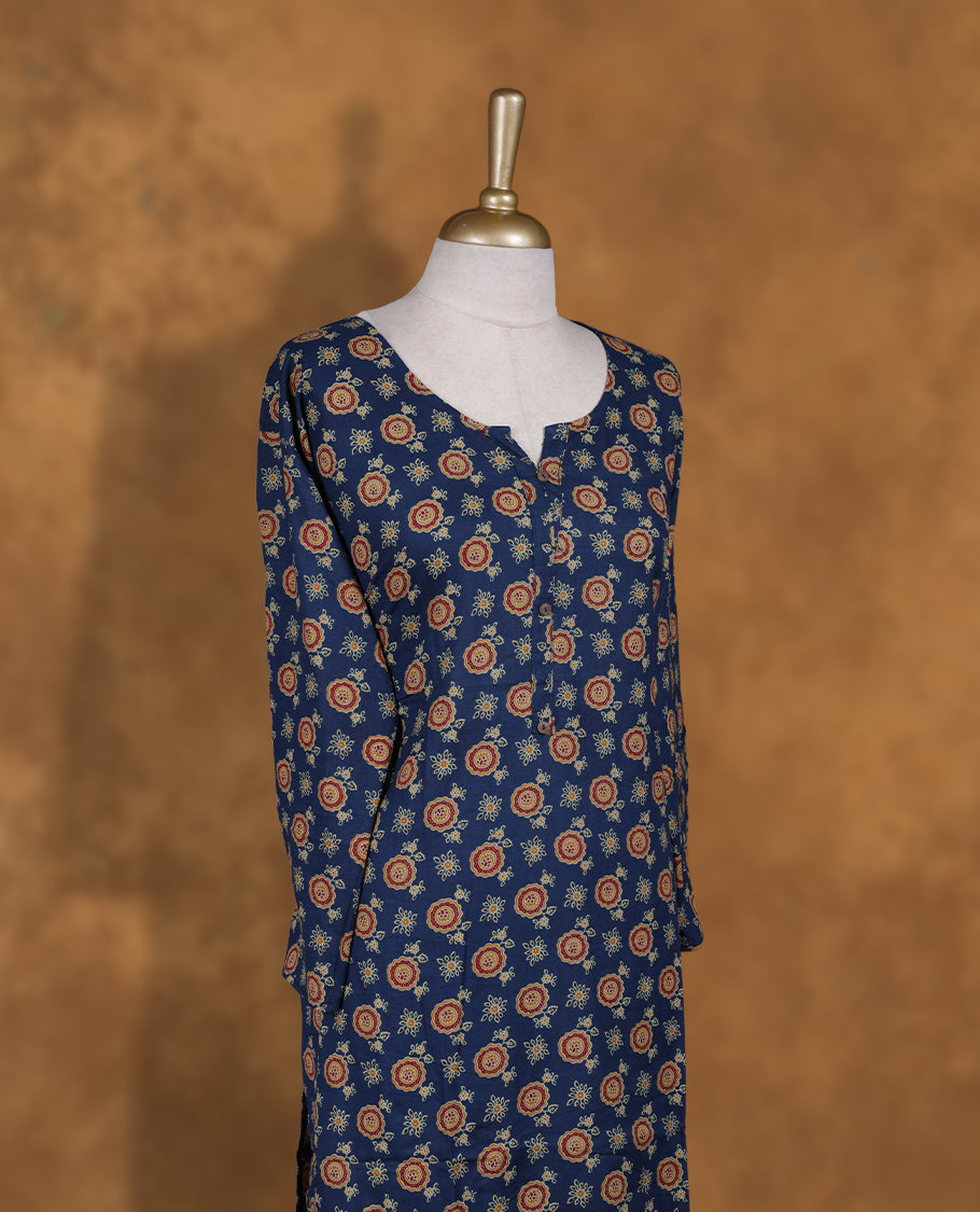 Dark blue colour Kurti featuring multicolour floral print pattern across, round neckline with split, and sleeves,