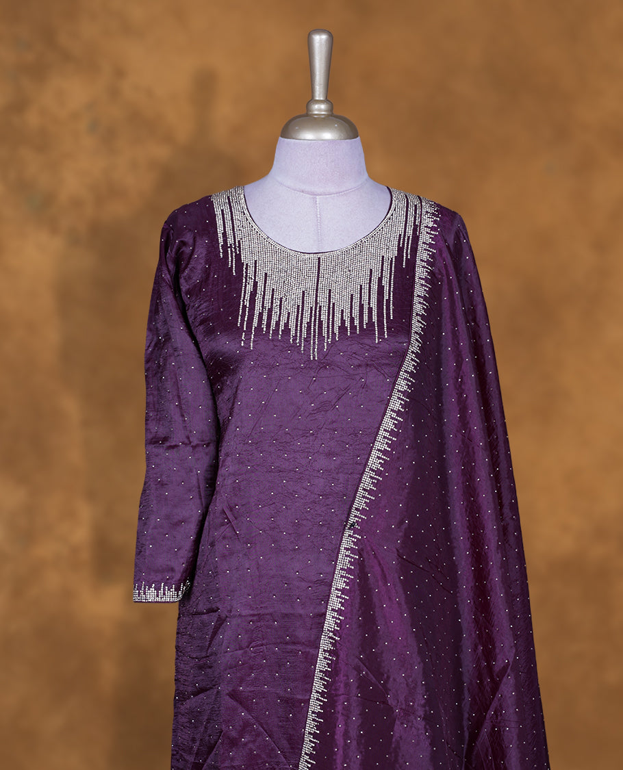 Grape colour sharara set featuring gold stone pattern neckline, sleeves, and stone pattern across on body , Paired with a matching dupatta