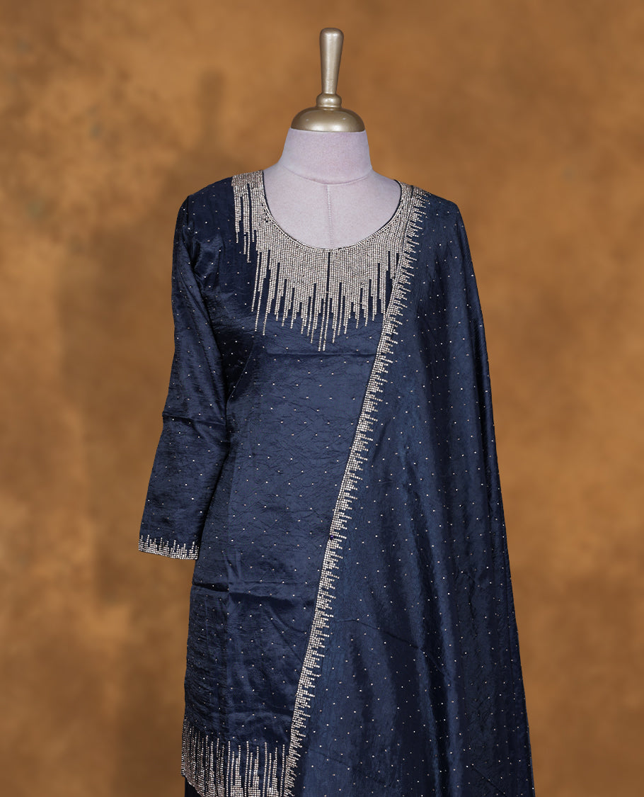 Dark imperial blue colour sharara set featuring gold colour stone worked on neckline, sleeves, and Stone scattered on body , Paired with a matching dupatta
