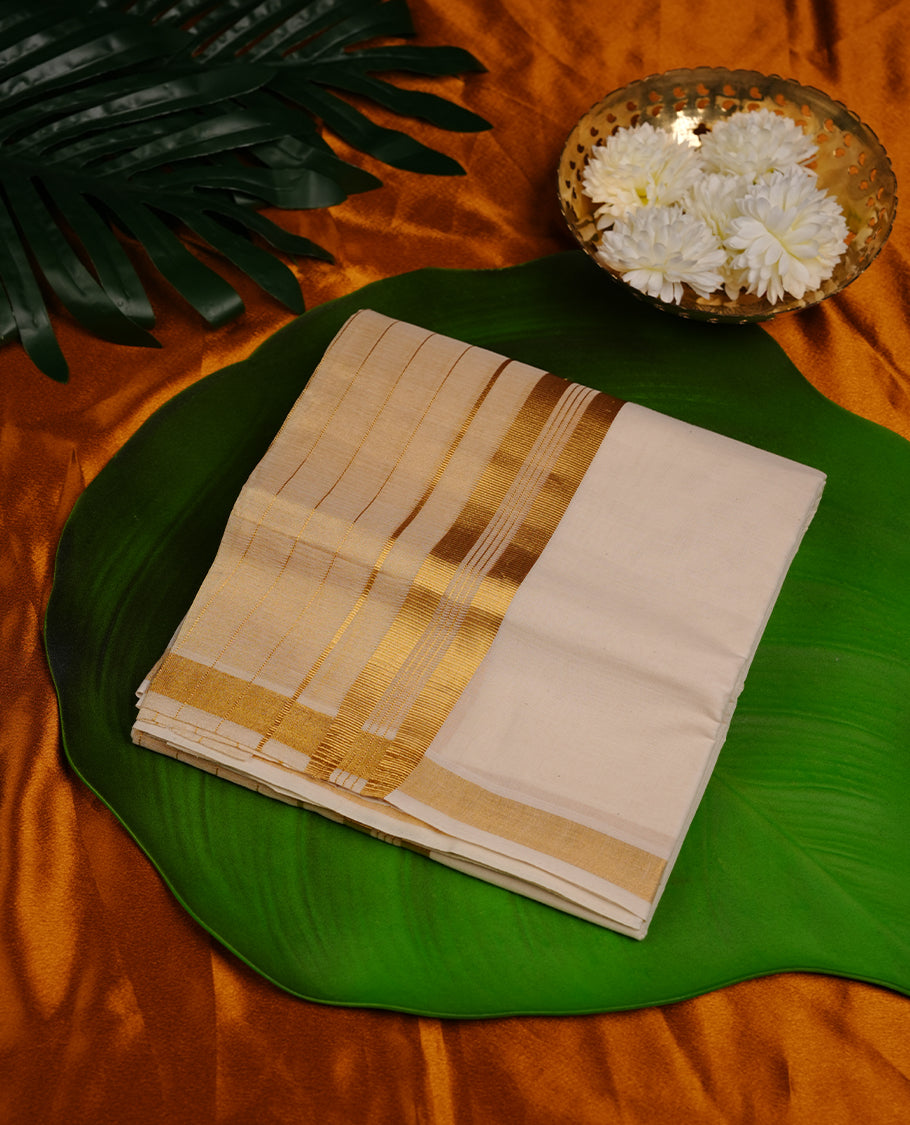 Cream colour cotton double dhoti featuring gold kasavu zari border