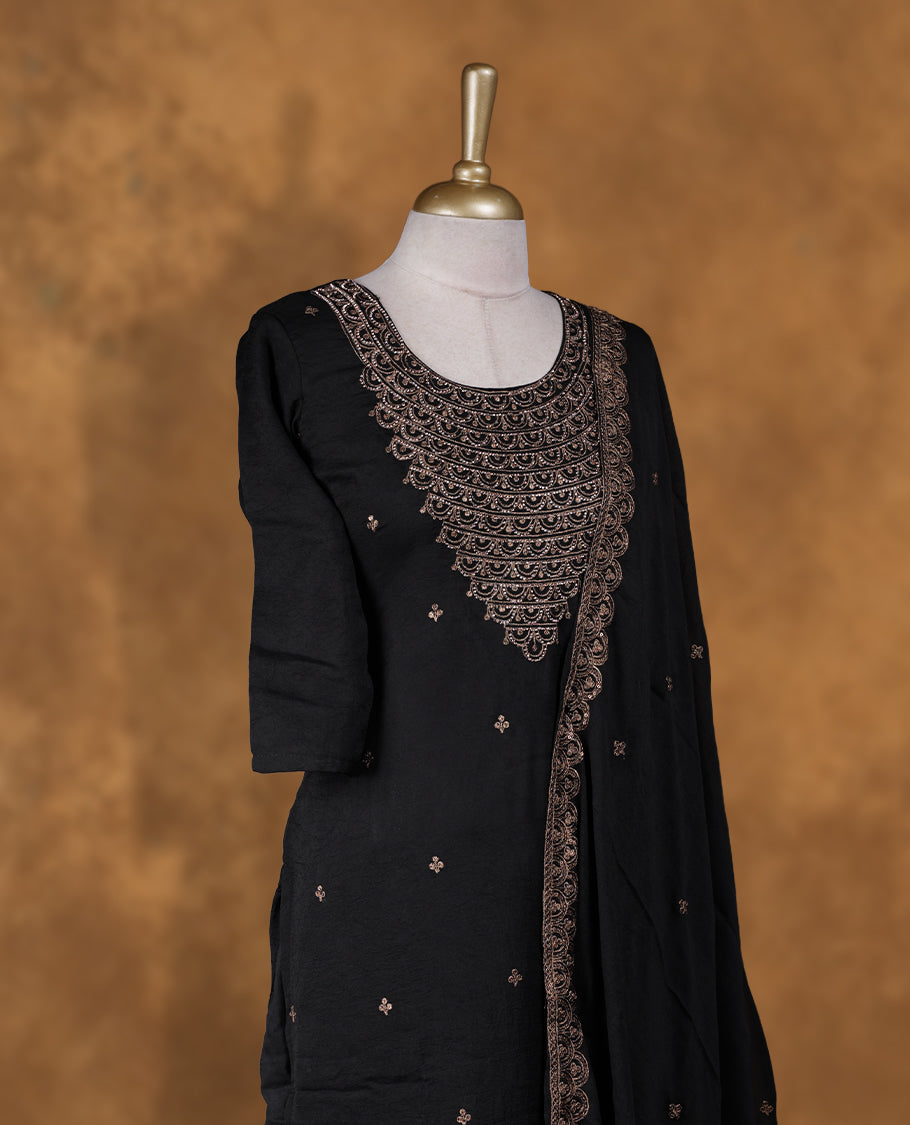 Black colour sharara set featuring thread embroidered and stone neckline, sleeves, and thread embroidery on body , Paired with a matching dupatta