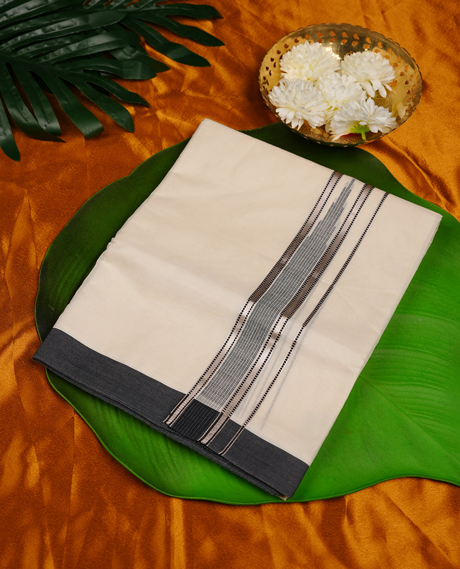 Cream colour RAMRAJ cotton double dhoti featuring black colour border with silver zari border