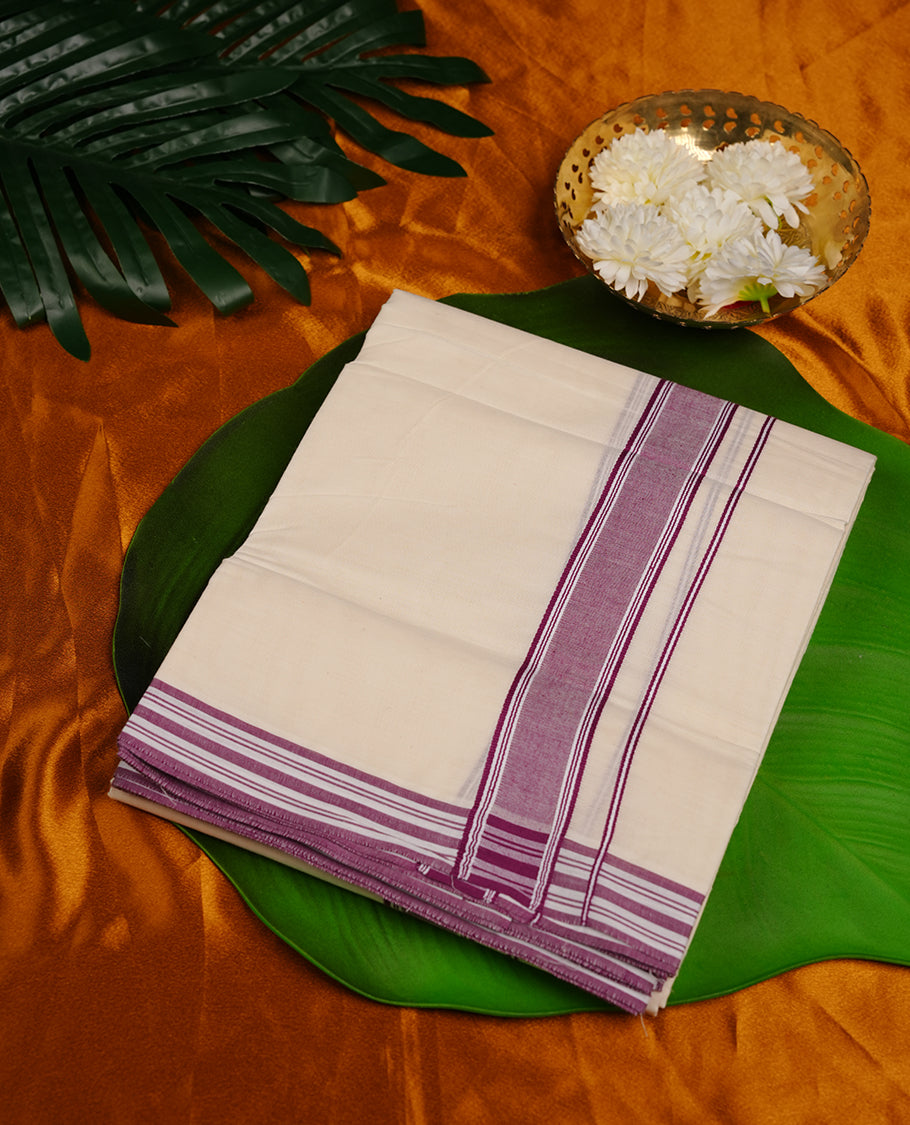 Cream colour cotton double dhoti featuring purple colour border