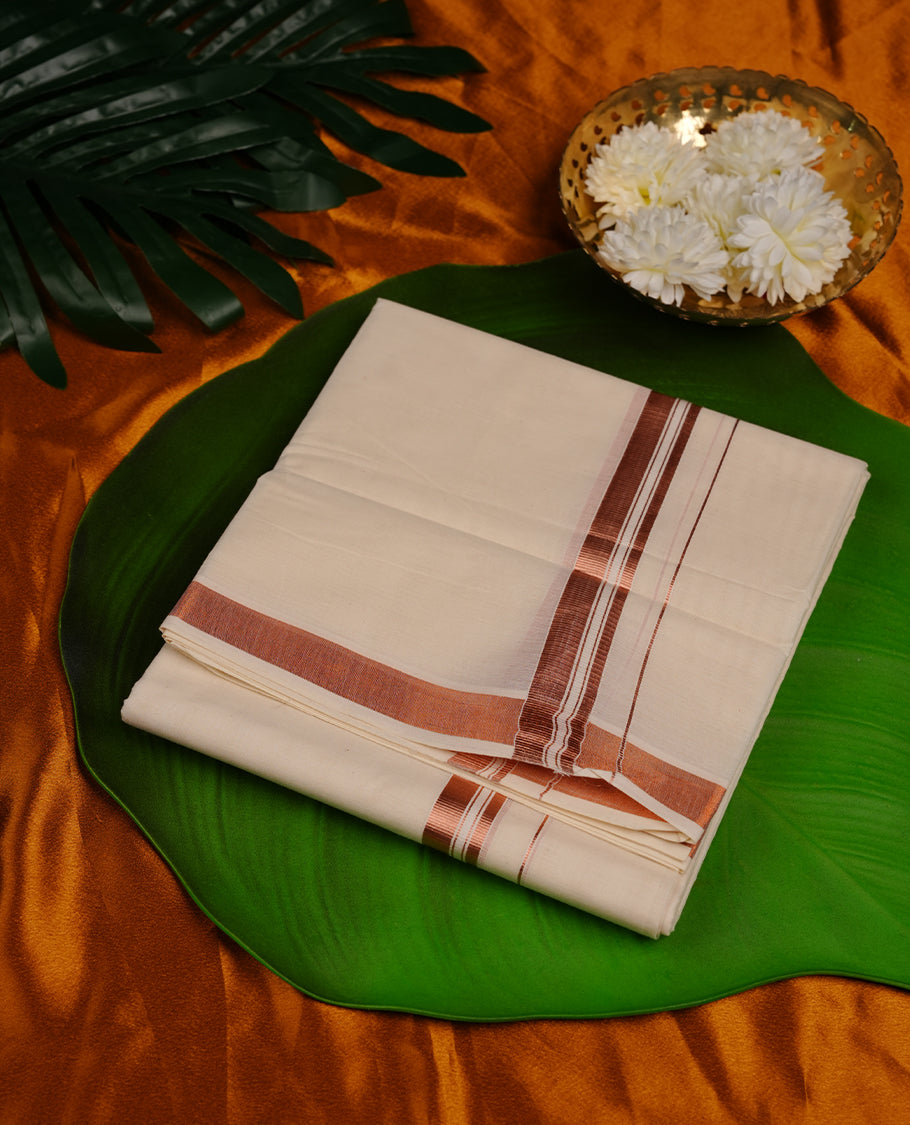 Cream colour cotton double dhoti featuring copper border